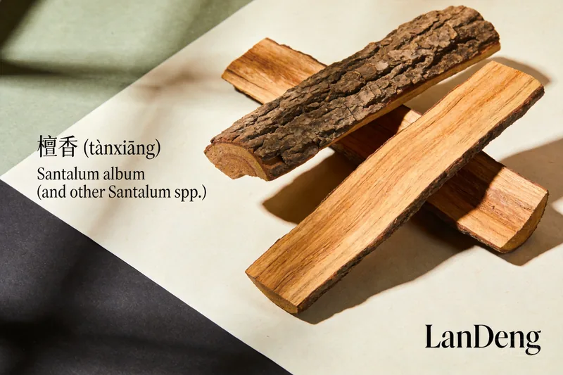 Creamy sandalwood slices and powder on rice paper.